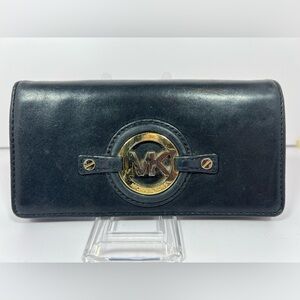 2120: Michael Kors MK Medallion Flap Wallet Black Leather Large
